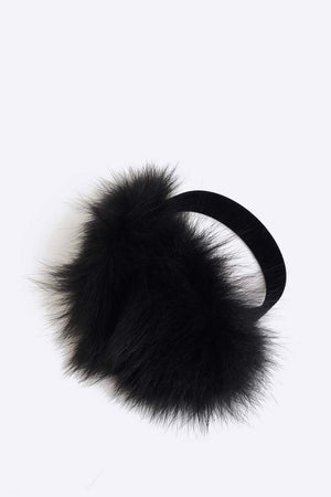 Classic upcycled fox fur earmuffs. Ultra soft and warm earmuffs. They have a polyester lining and velvet trim. Cut, dyed and stitched by hand. Hand made in Montreal. 